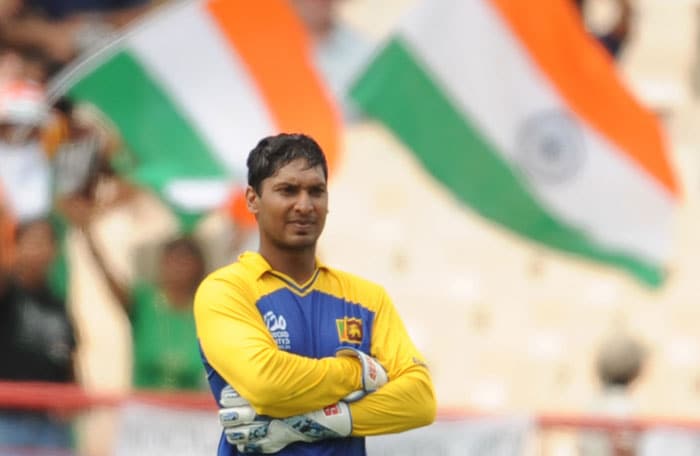 Kumar Sangakkara reacts after Indian cricketer Suresh Raina plays a shot during the ICC World Twenty20 Super Eight match between Sri Lanka and India at the Beausejour Cricket Ground. (AFP Photo) WT20: Ind vs SL