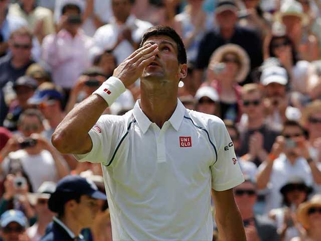 Photo : Wimbledon: Novak Djokovic, Serena Williams March on Despite Heat