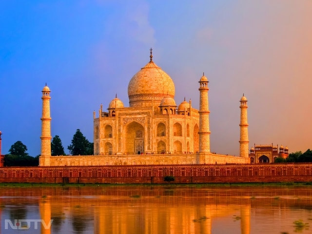 5. Taj Mahal, India
Watch the Taj Mahal transition from bright white to amber as the sun sets. The monument's changing hues make this moment a photographer's dream and a traveller's highlight.