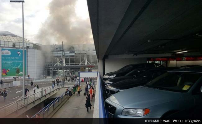 At Brussels Airport, Windows Blown Out, Smoke Fills The Air