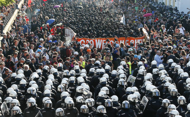 75 Police Injured At Anti-G20 Protests As Chancellor Angela Merkel Seeks Policy Consensus