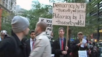 Occupy Wall Street protestors cheer Rajat Gupta's arrest