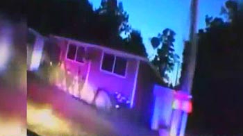 Police car crashes into another car and a house