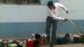 Cellphone clip shows seniors hitting younger students with belt