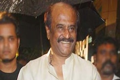 Rajinikanth turns babysitter for grandson Rajinikanth turns babysitter for grandson