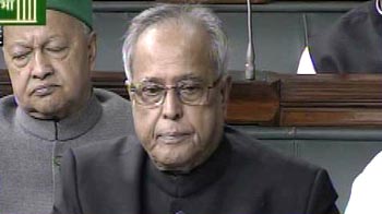 Tough times, but not eating lizards: Pranab on economy
