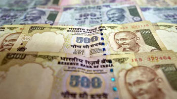 Rupee hits record low, breaches 54 to the dollar