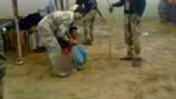 Video : BSF जवानों ने व्यक्ति को नंगा कर पीटा
