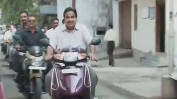 Maharashtra civic polls: Gadkari rides a scooter