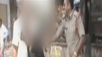 Andhra cops beating teen caught on camera Andhra cops beating teen caught on camera