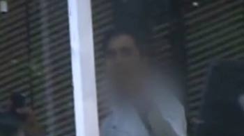 In anti-corruption case, Congress leader's BMWs seized; son flips off crowd In anti-corruption case, Congress leader's BMWs seized; son flips off crowd