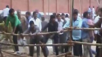 Video : No goonda raj? SP workers attack reporters