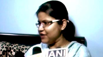 Slain IPS officer's wife demands CBI inquiry Slain IPS officer's wife demands CBI inquiry