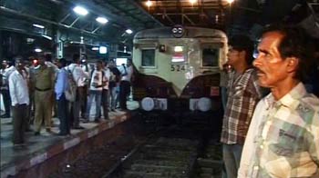 Fire disrupts Mumbai local train services; delays likely to continue Fire disrupts Mumbai local train services; delays likely to continue