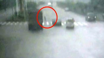 Video : Child narrowly escapes death from under truck
