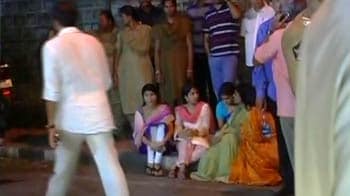 Video : Jagan's wife, mother, sister sit on road in protest