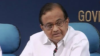 After court order, Chidambaram rejects demands for his resignation