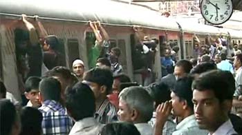 Angry crowds at Mumbai's Churchgate station, trains stalled by strike