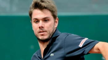 Video : Wawrinka succeeds Federer as Swiss flag bearer