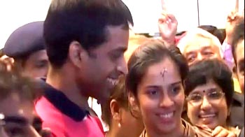 Super Saina Nehwal returns to hero's welcome