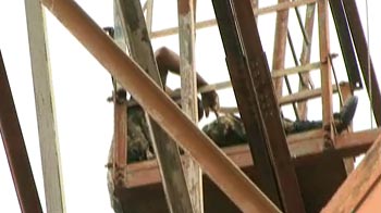 Armyman climbs 200-ft tower to protest threat from officer