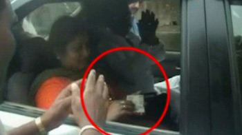 Freed from jail, Samajwadi Party MLA gives cash to policemen