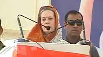 Sonia Gandhi avoids tit-for tat with Narendra Modi; defends FDI in retail