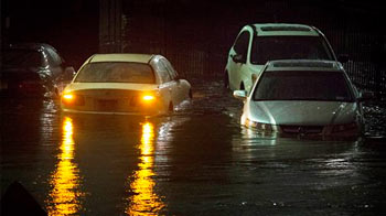 Superstorm Sandy makes landfall: New York plunges into darkness