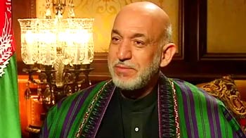 Karzai woos Indian firms for investment, says they will get red carpet welcome