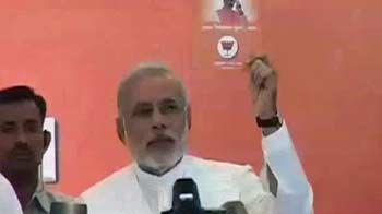 Flanked by Arun Jaitley, Narendra Modi releases manifesto for Gujarat