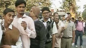 Record 70% turnout for Gujarat; Modi flashes victory sign