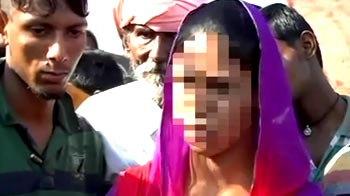 Suspending cops is not enough, says woman who was hit by officers