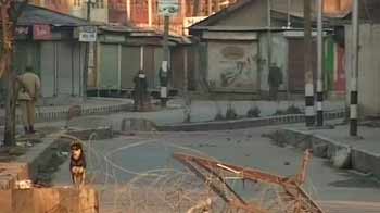 Kashmir on edge after young man's killing; Colonel named in FIR