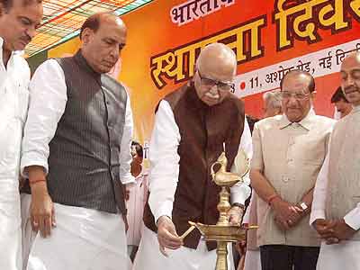BJP celebrates foundation day; Rajnath expected at Modi's function
