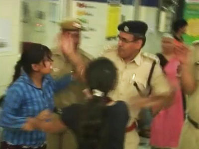 Watch woman protester at Delhi hospital slapped by cop