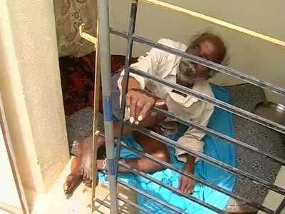 In Bangalore, he was found chained on roof of son's house