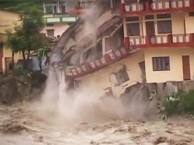 Watch: in torrential rain, house collapses in Uttarakhand