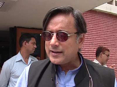 Twitter minister Tharoor takes on Modi