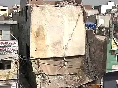 Four-storey building collapses in Delhi, one killed