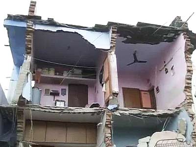 Ahmedabad building collapses, at least three feared trapped