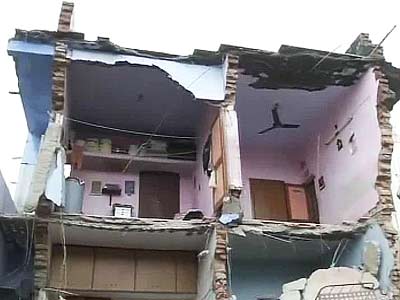 Ahmedabad building collapses, at least three feared trapped