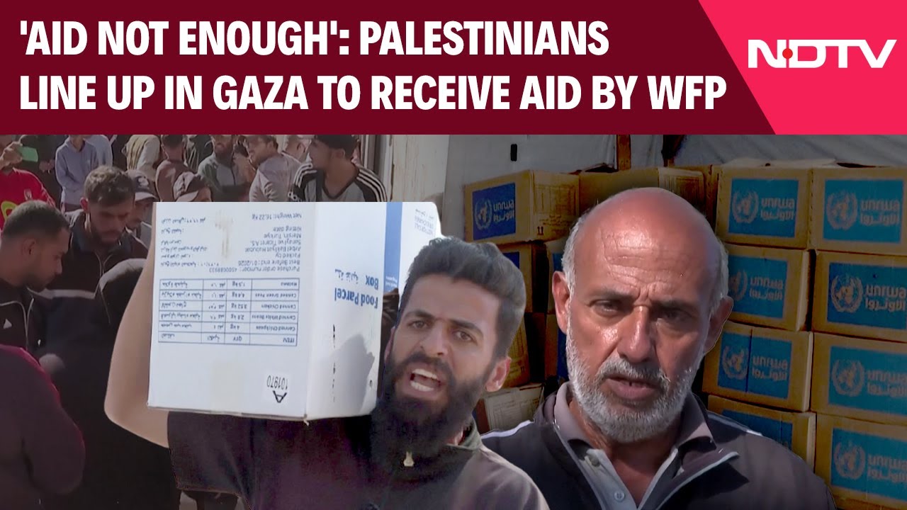 Palestinians Line Up In Gaza To Receive Food Parcels Distributed By WFP
