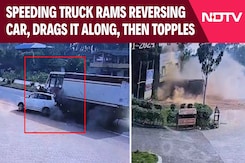 Speeding Truck Rams Reversing Car, Drags It Along, Then Topples In Karnataka Speeding Truck Rams Reversing Car, Drags It Along, Then Topples In Karnataka