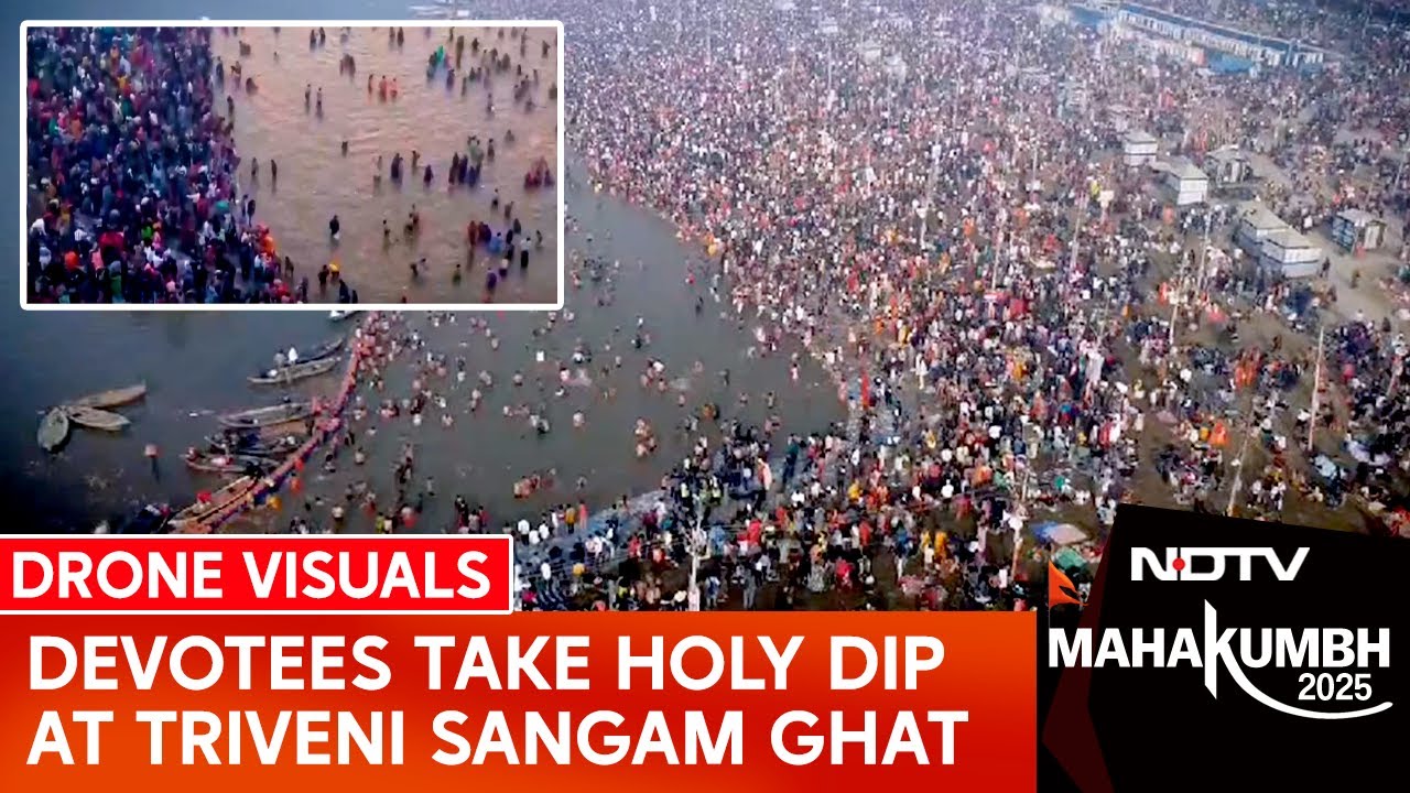 Devotees Take Holy Dip At Triveni Sangam Ghat