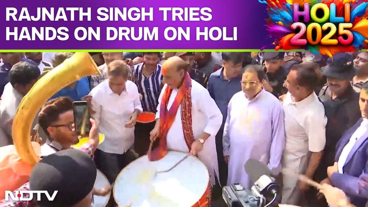 Defence Minister Rajnath Singh Tries Hands On Drum At Holi Celebration