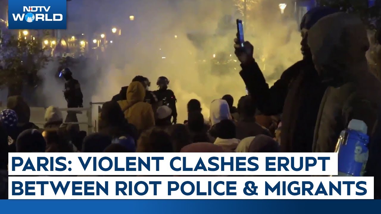 Violent Clashes Erupt Between Riot Police And Migrants During Paris Eviction