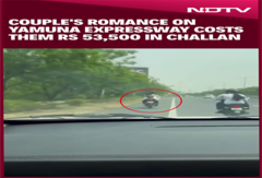 Woman Sits On Petrol Tank & Hugs Man Without Helmet On Yamuna Expressway, Police Issues Challan Woman Sits On Petrol Tank & Hugs Man Without Helmet On Yamuna Expressway, Police Issues Challan