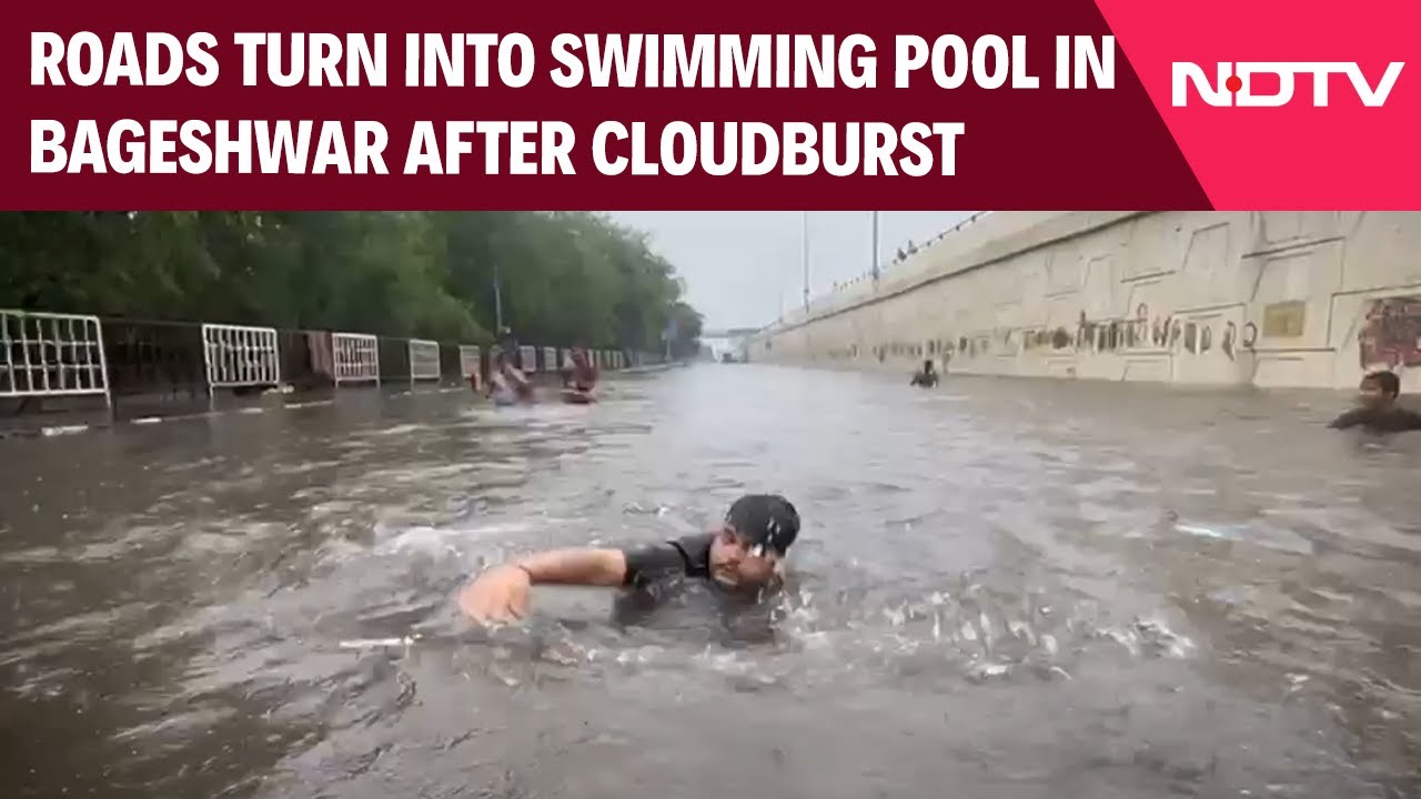 Bageshwar Roads Turn Swimming Pool After Cloudburst | MLA Swept by Stream, Rescued by SDRF Bageshwar Roads Turn Swimming Pool After Cloudburst | MLA Swept by Stream, Rescued by SDRF