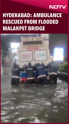 Hyderabad: Ambulance Rescued From Flooded Malakpet Bridge Hyderabad: Ambulance Rescued From Flooded Malakpet Bridge