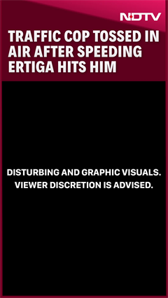 Delhi Meerut Expressway: Traffic Cop Tossed In Air After Speeding Ertiga Hits Him Delhi Meerut Expressway: Traffic Cop Tossed In Air After Speeding Ertiga Hits Him